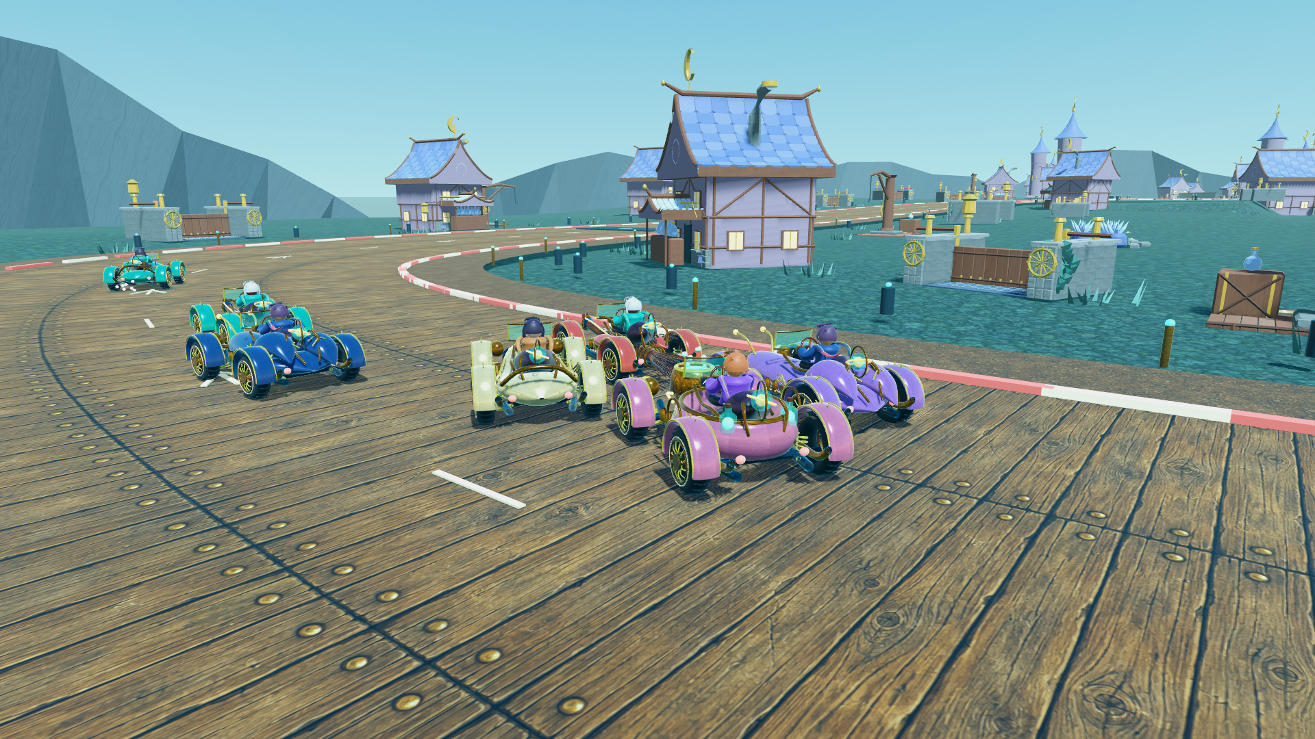 Coches de The Magic Bay compiten en un circuito costero junto a edificios de tejados azules.